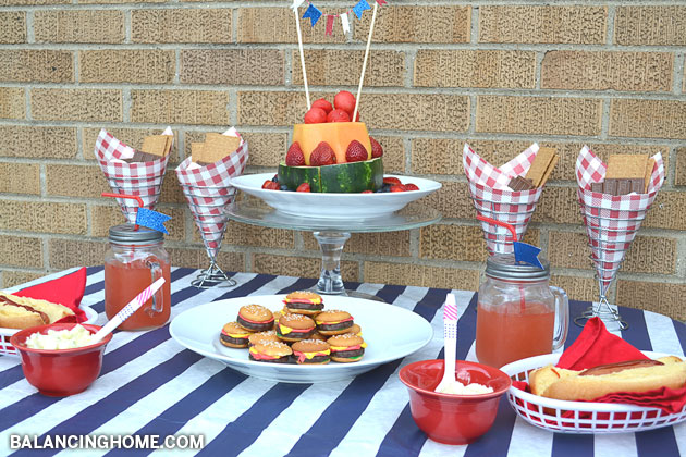 Summer Fun! Dying over those mini hamburger cookies and what a fun way to serve fruit and summer's must-have dessert--S'mores! 