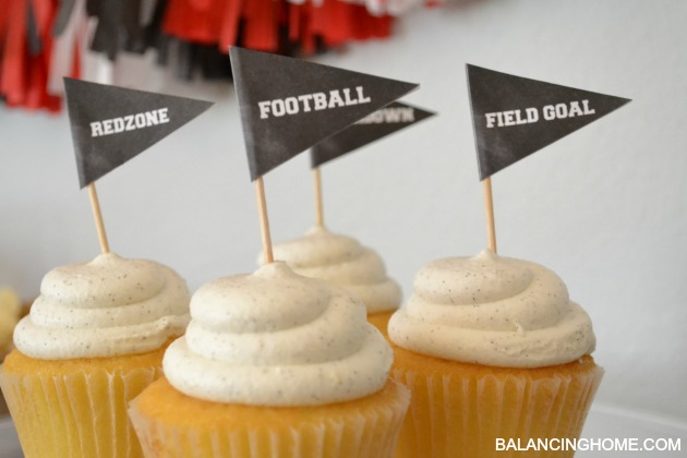 Football Party with lots of printables: Chalkboard playbook printable, varsity letter pennant printable, cupcake topper printables. Simple tips for entertaining like paper bag serving bowls, customized water bottles, and DIY tassel bunting.