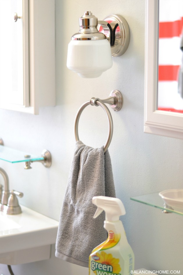 cleaning-organizing-bathroom-with-pedestal-sink-towel-hook